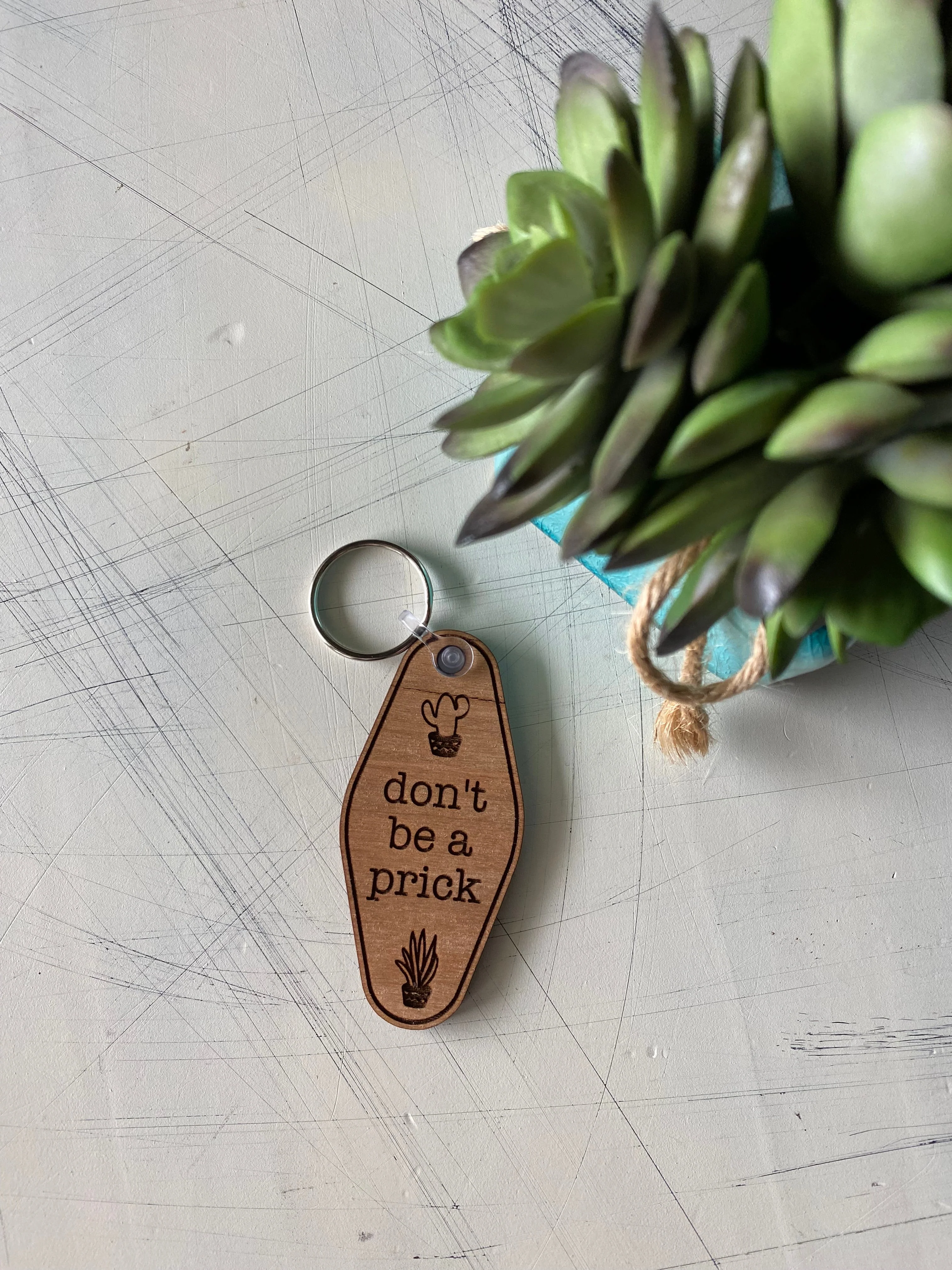 Don't be a prick - Wood Motel-style Keychain - Image 3