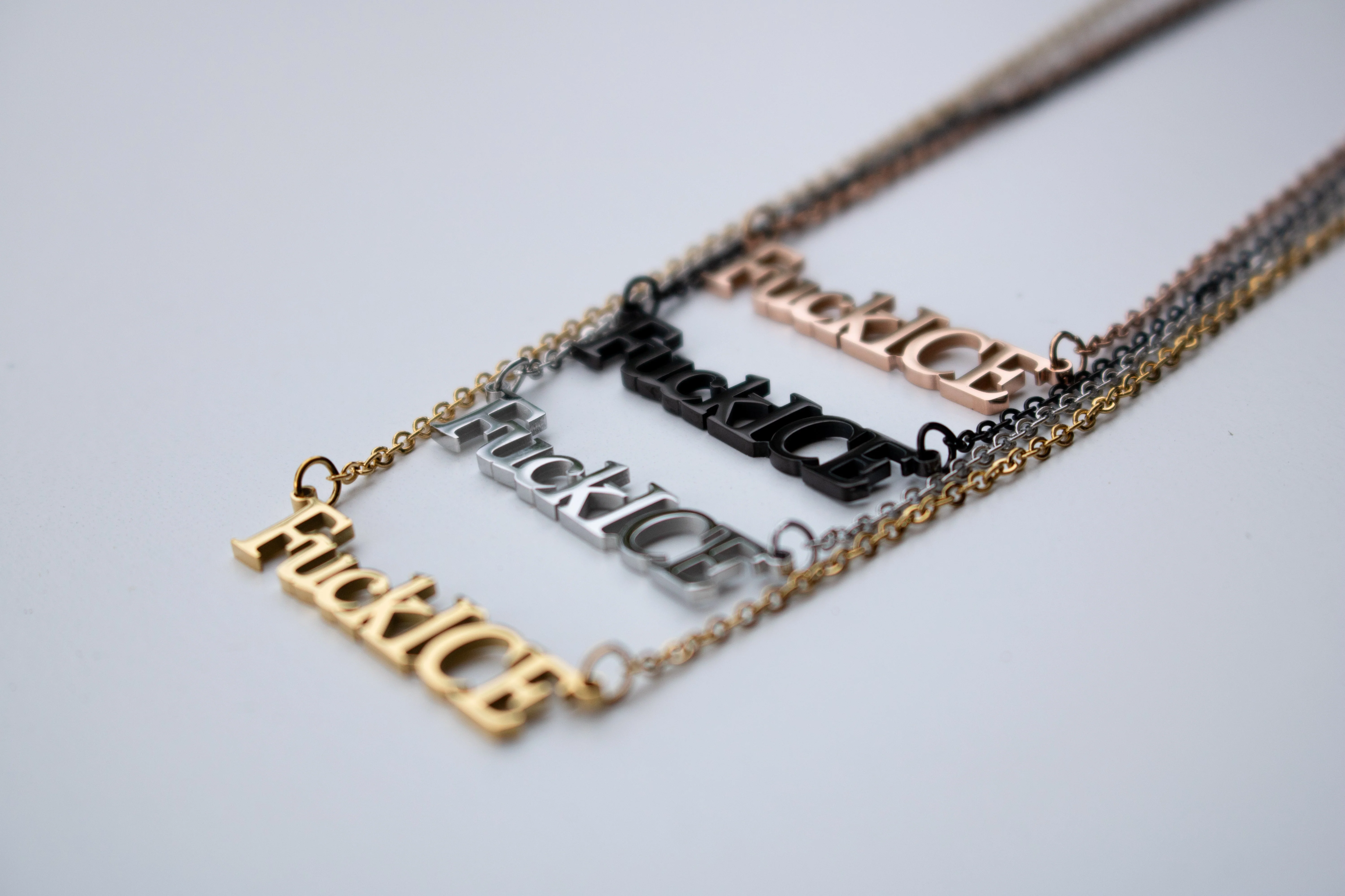 Fuck ICE Cutout Necklace - $10 from each necklace donated to National Immigrant Defense Center - Image 2